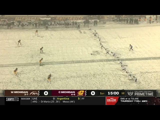 college football is being played in a snowstorm 