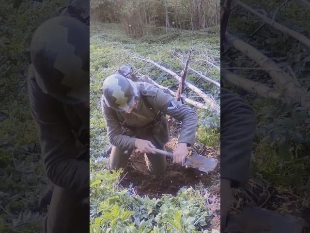 A Wehrmacht soldier digs a shelter for himself #reenactment #ww2