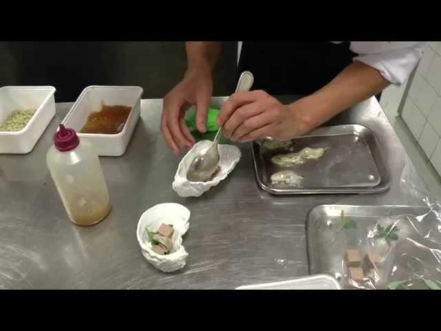 Philippe Favié prepares a starter with oyster at the Michelin star Latour