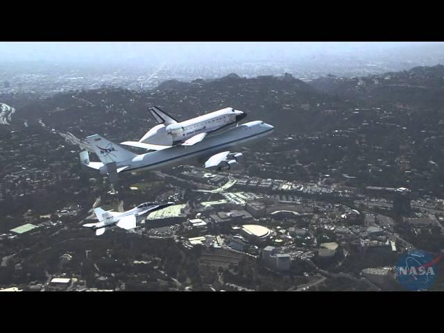 F/A-18 extended view of Space Shuttle Endeavour's flyover Southern California