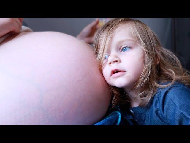 Sister Reacts to Baby Moving inside Mommy's Big Pregnant Belly