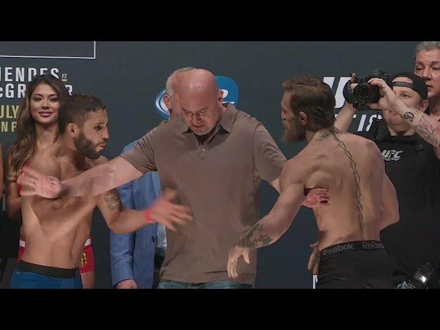 Conor McGregor and Chad Mendes weigh in for UFC 189