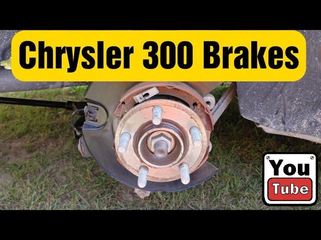 Changing rear brakes on a 2015 chrysler 300 and adjusting emergency brakes.