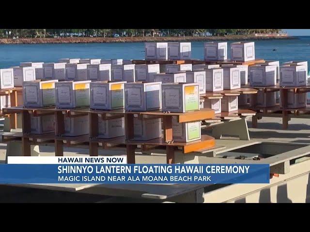 Crowd gathers for lantern floating ceremony at Magic Island