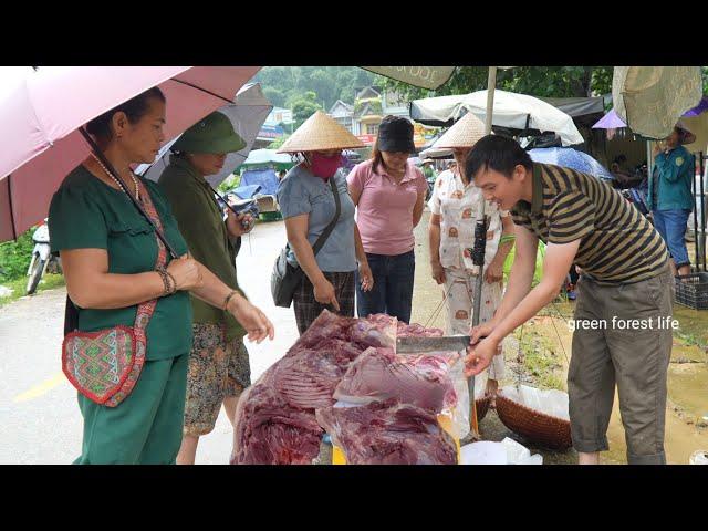 Robert sells wild boar meat at the market. Green forest life