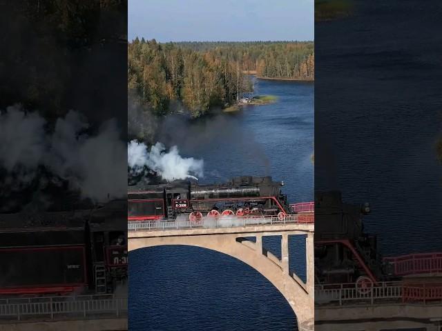 Retro train "Ruskeala Express" rushes across a bridge in Karelia #locomotiv #retro