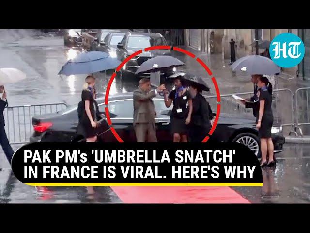 Pak PM 'Pulls' Umbrella From Woman Officer in France; She Is Drenched In Rain | Watch