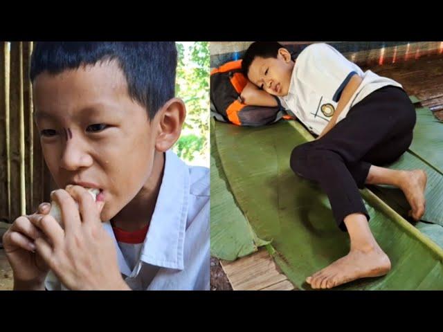 Orphan boy stayed home alone waiting for his mother, eating grapefruit.