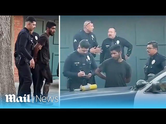 Homeless man allegedly using blowtorch is tackled by locals in LA as cops confirm wildfire is arson