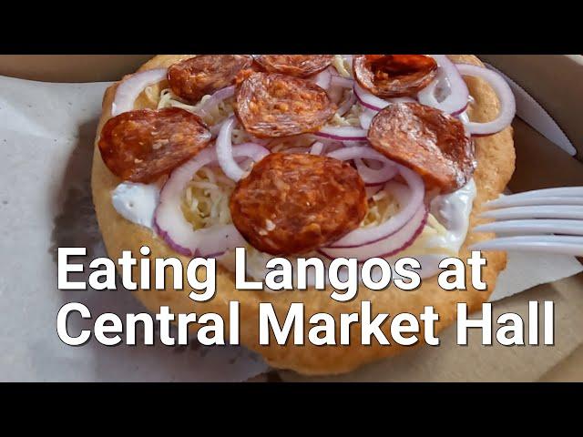 Trying Langos at the Central Market Hall in Budapest