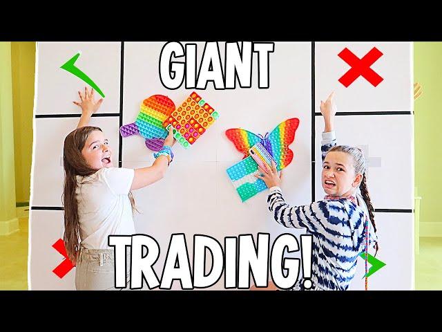 FIDGET TRADING ON A GIANT FIDGET BOARD!! | JKREW