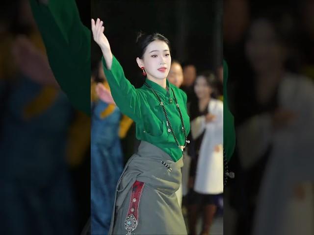 LiLi,  sweet and lovely beautiful Tibetan woman, traditional Tibetan dance