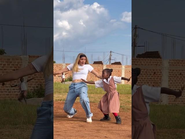 Did you spot the kid behind us?? #uganda #wop #dance #trend #shorts #isabellafro