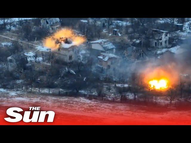 Ukrainian forces blast Russian buildings with Rapira MT-12 anti-tank guns