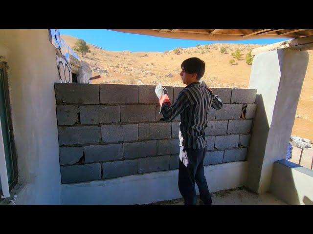 "Collaboration in Construction: Uncle Abu and Ali's Meeting and the Block Wall Project"