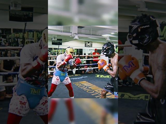Floyd Mayweather Jr. counterattacks during a sparring session.