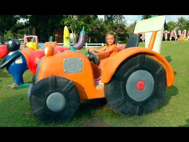 Max and Katy play with daddy on Sheep farm