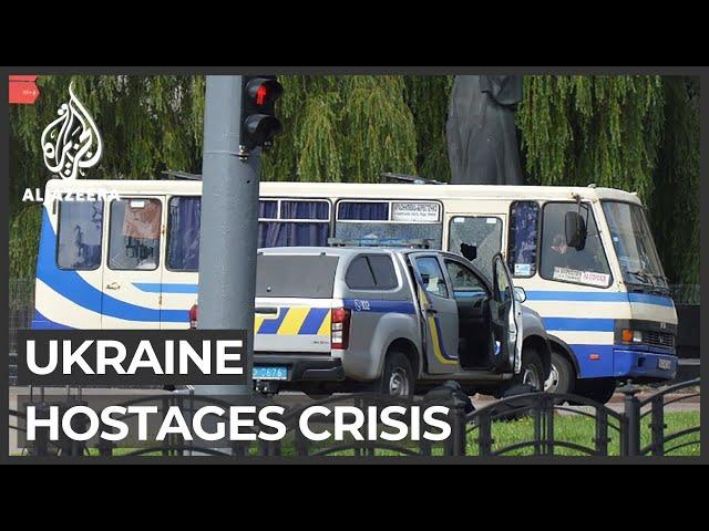 Ukraine police free 13 hostages trapped on bus after standoff