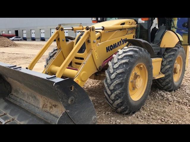 Универсальный солдат))) Экскаватор погрузчик Komatsu WB97s