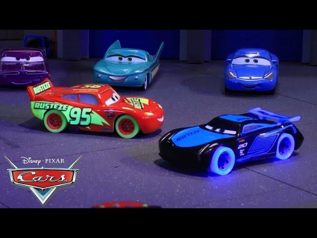 Jackson Storm Challenges Lightning McQueen on the Glowing Race Track! | Pixar Cars