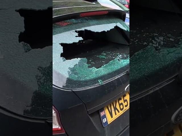 CARAVAN SMASHES CAR WINDOW