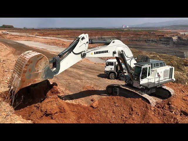 Liebherr 984 Excavator Loading Mercedes And MAN Trucks - Labrianidis Mining Works