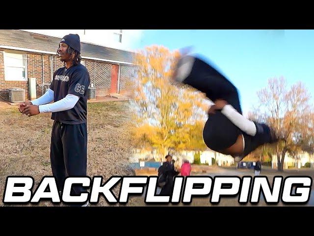 Duke Dennis recreates his old backflip video