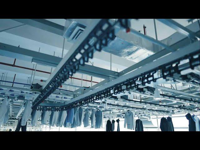 GLOBALink | Smart tech at E China clothing factory improves efficiency, working environment