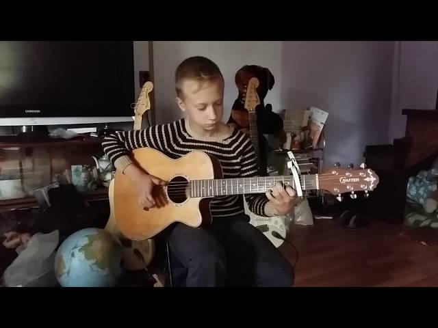 Юный виртуоз гитарист играет Tommy Emmanuel