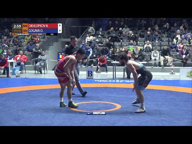 Qual. FS - 61 kg: N. OKHLOPKOV (ROU) v. O. GOGAVA (GEO)