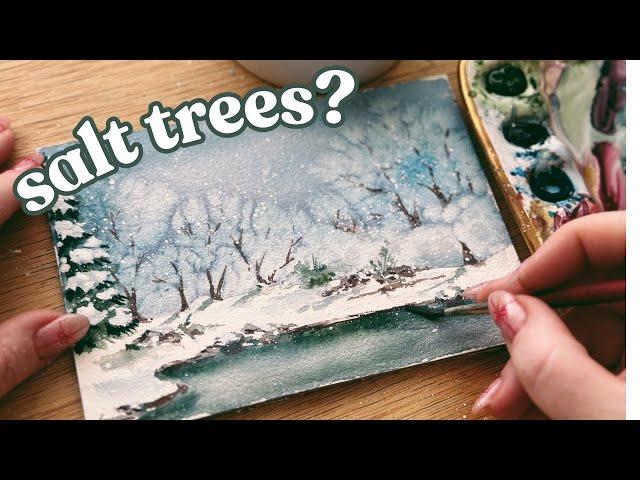 Watercolor snowy trees using salt and painting a spontaneous snowy landscape