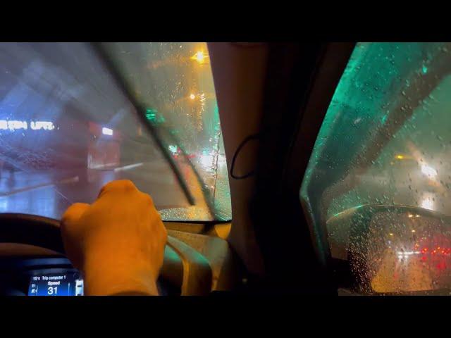 Night uber driving on heavy rain