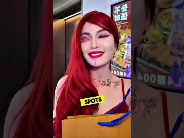This Woman Shows up for a Looking Extra Flamboyant With Fiery Red Hair and a Fake Pregnant Belly