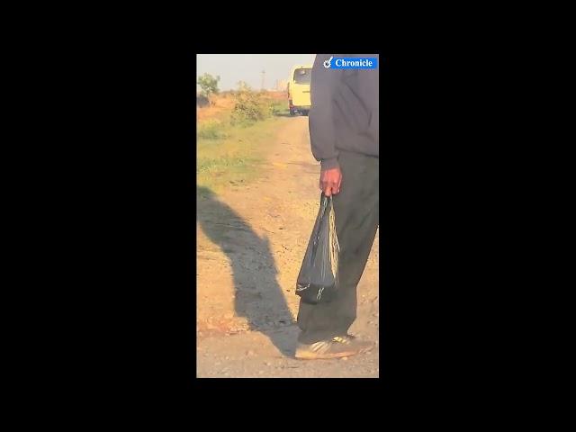 Watch  Zimbabwe police officers arrested after being caught on camera taking bribes at a roadblock