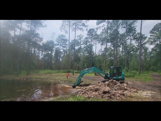 Building a Pond Dam With the Excavator