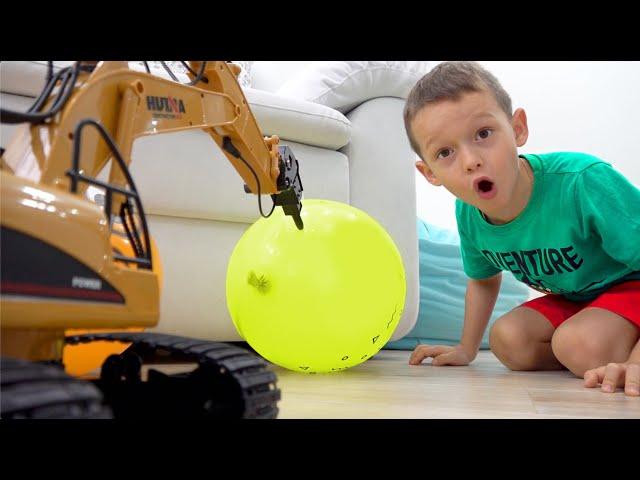 Sophia and Max are playing with a toy excavator tractor and balloons