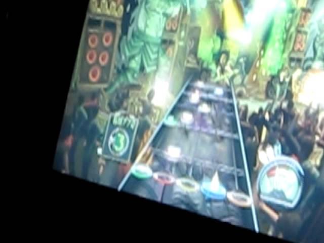 Playing Guitar Hero III on expert...without looking