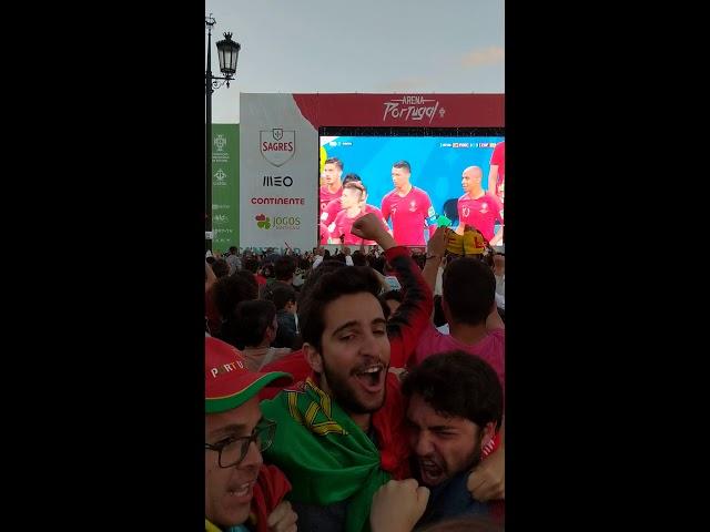 Portugal fans going crazy after Ronaldo's free-kick goal for 3-3 in Lisbon square.