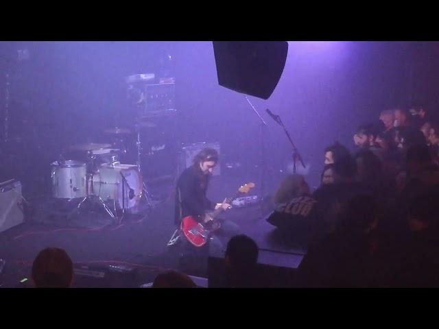 A Place To Bury Strangers. Oliver Ackermann and John Fedowitz tune the guitars before the show.