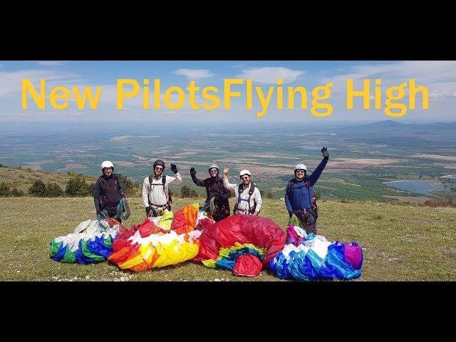 Newly Qualified Paraglider Pilots on their first flight after school