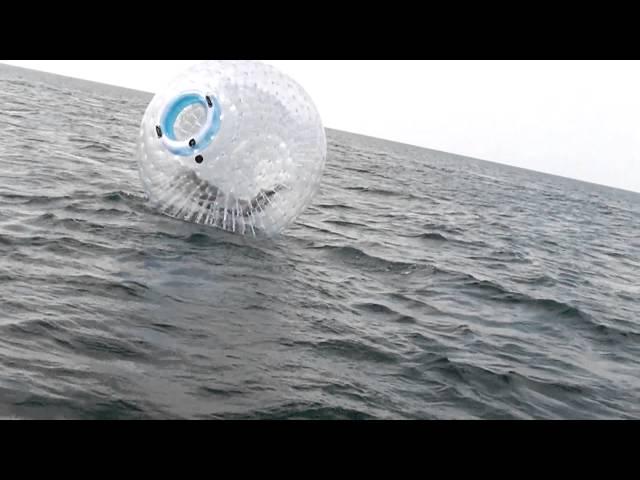 ZORBING-ON-WATER: zorb, orb, ball, "hamster ball", sphere, globe