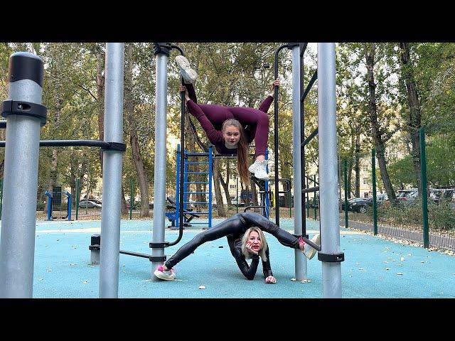 Outdoor Contortion. Two Circus Girls. Extreme Stretching. Flexshow