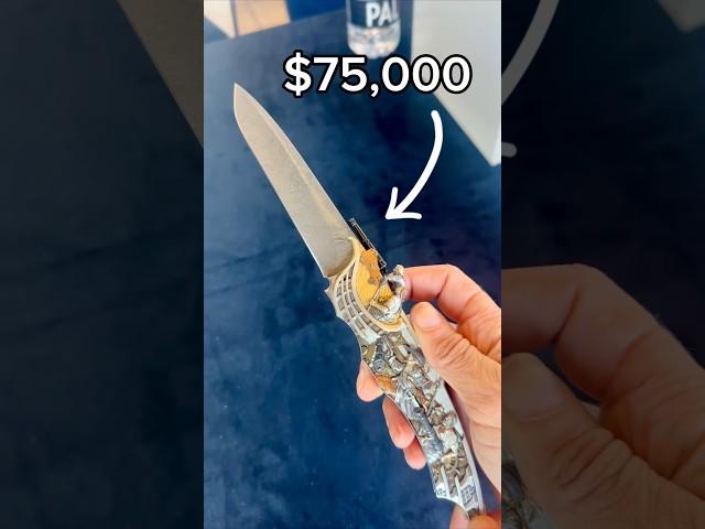 Holding $75,000 Automatic Knife