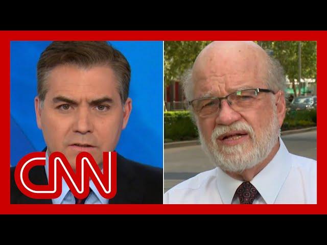 Jim Acosta challenges NRA board member