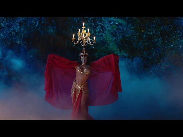 ALIA Dances in the Night with Her Magic Candelabra