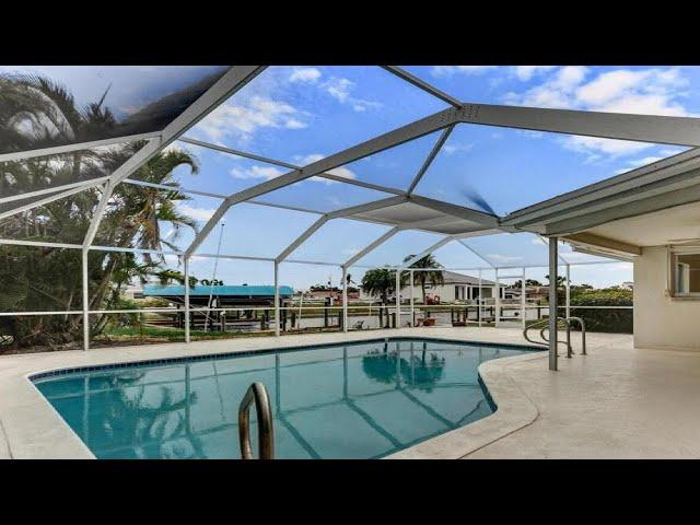 Price Reduction! Direct Gulf Access with Boat Lift Cape Coral Florida Homes for Sale by Steven Chase