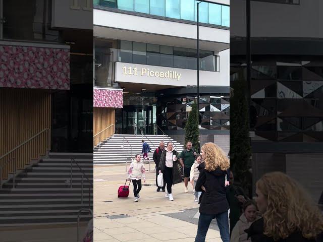 Walking through the breeze in Manchester Piccadilly