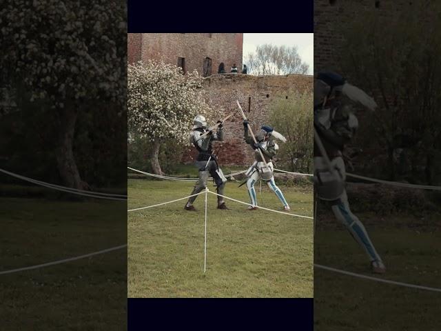 Landsknecht fighting against an Armoured Knight