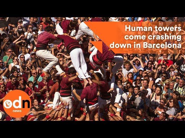 Spectacular human towers come crashing down in Barcelona