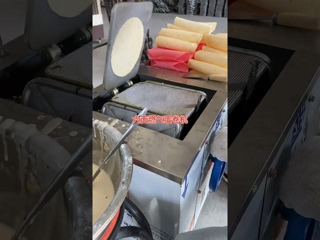 The six-sided egg roll machine is a good helper for setting up stalls assembleba photosynthetic